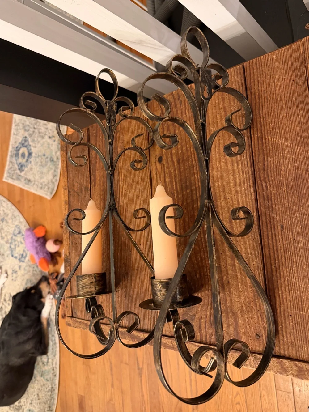 Rustic Scroll Metal Wall Sconce Pair with Cream Candles